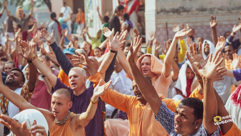 Devotees dancing in ecstatic kirtan