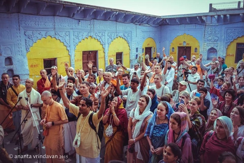A courtyard filled with devotees
